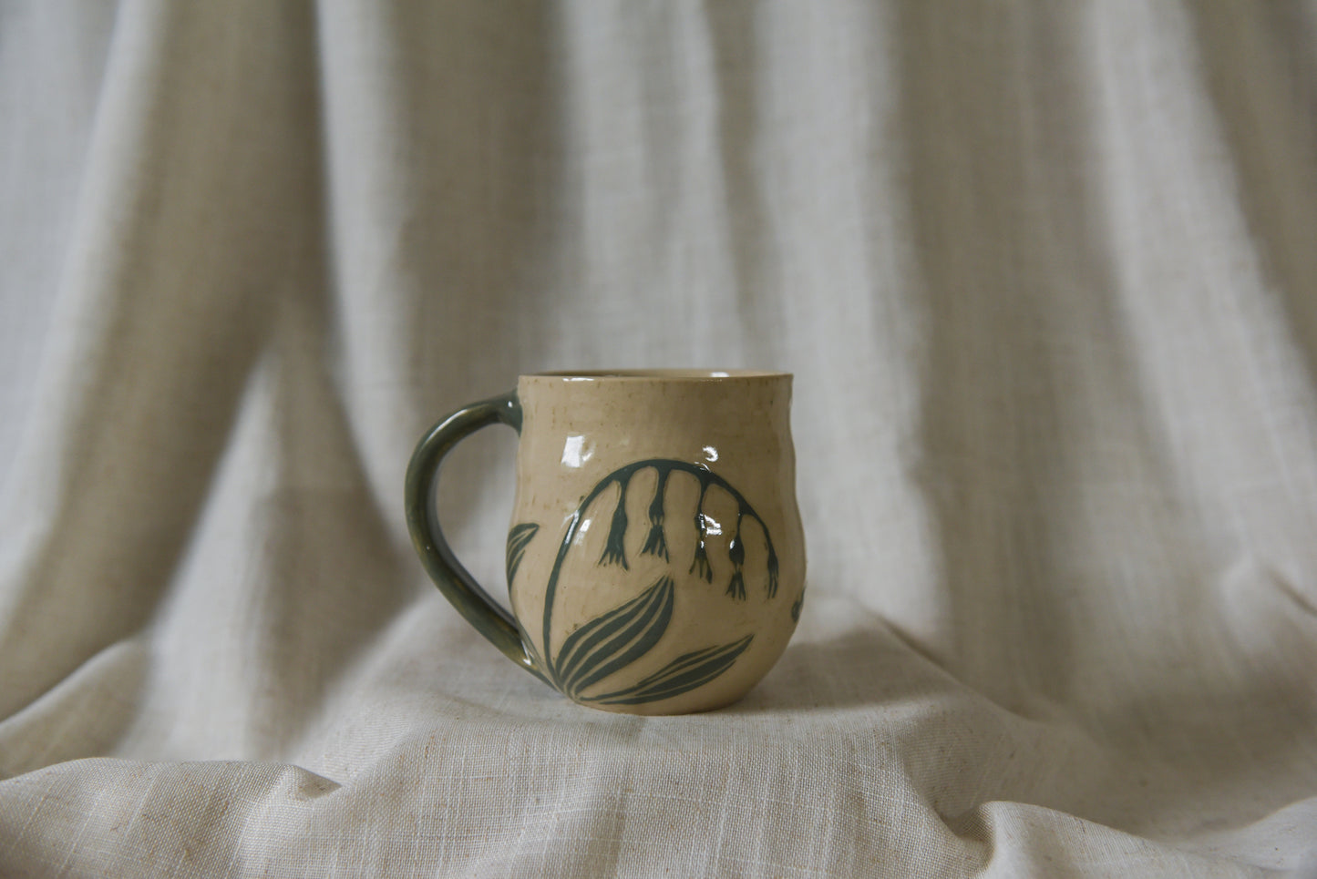 Moth and flowers mug