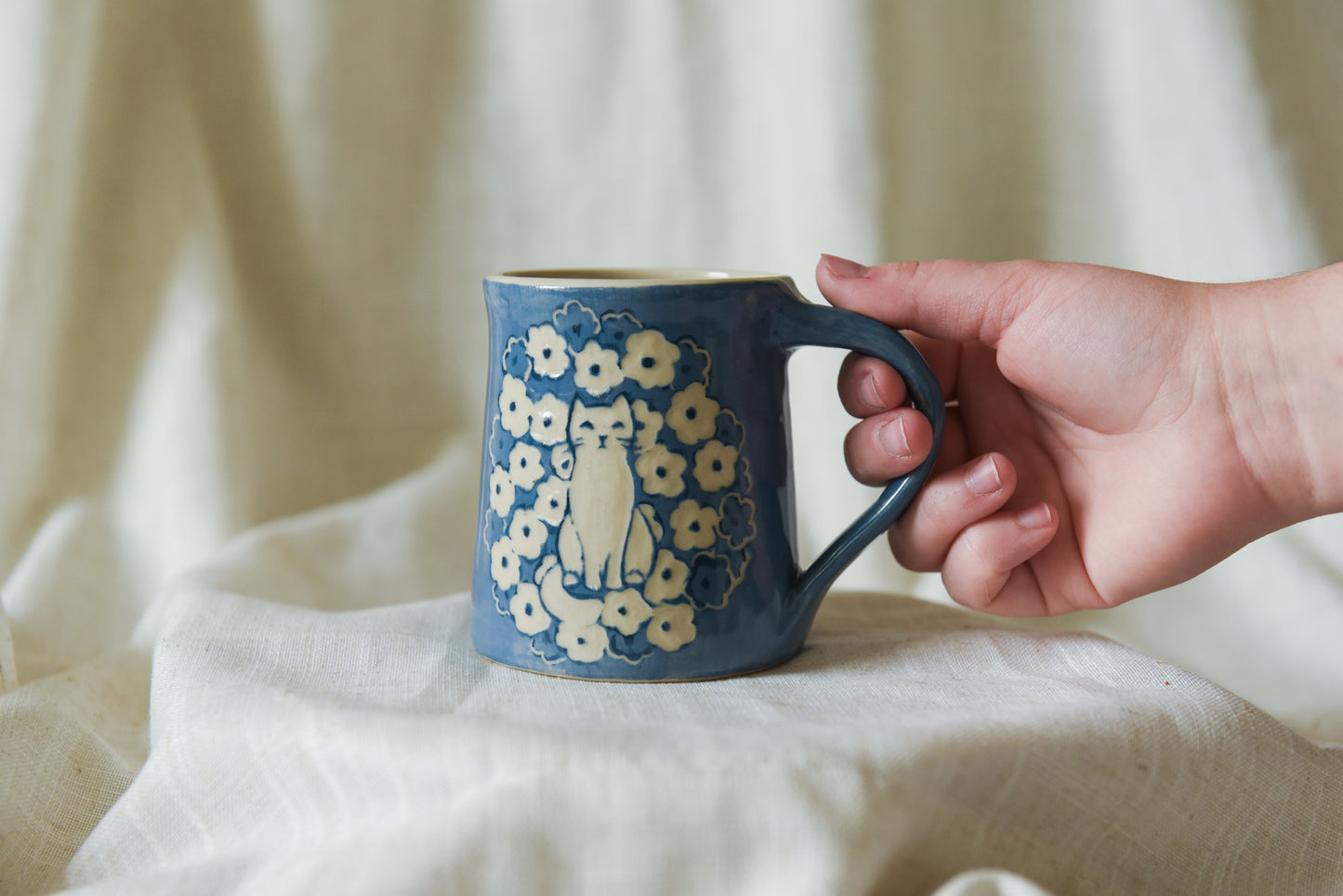 Cat in a Flower Field Mug