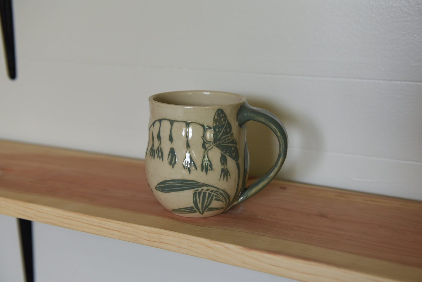 Moth and flowers mug